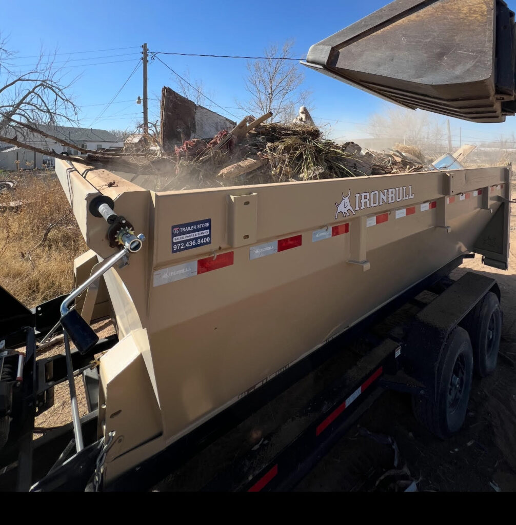 15 yard dumpster with debris in it