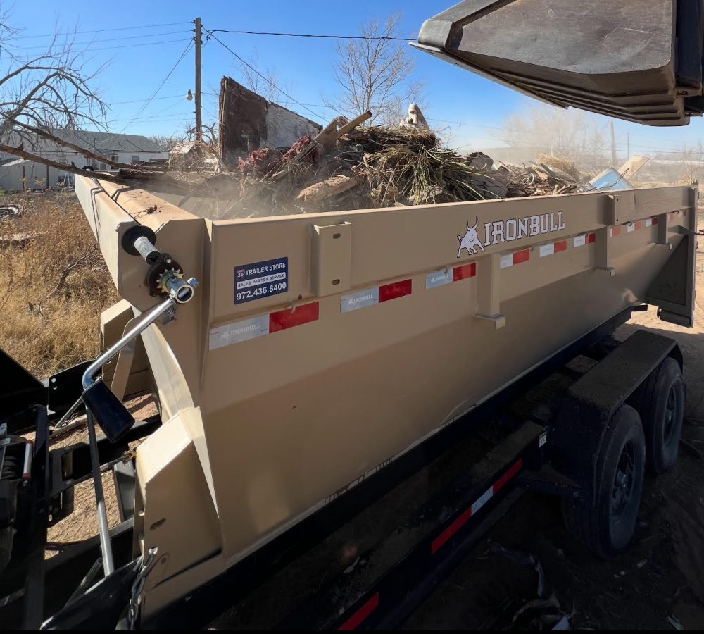 15 yard dumpster with debris in it